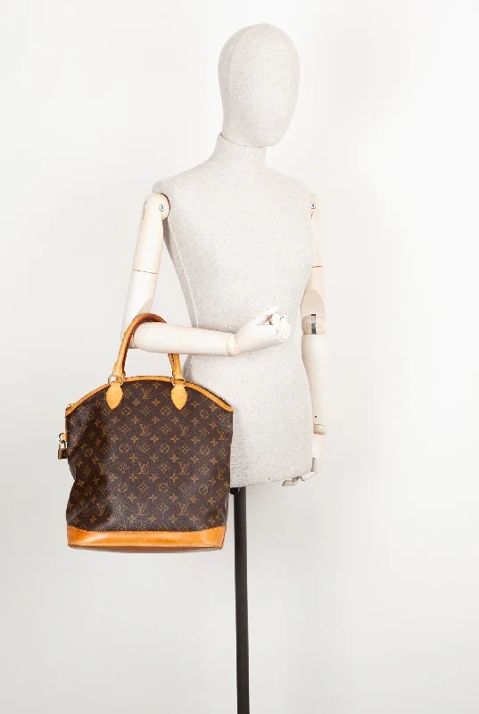 LOUIS VUITTON Lockit MM Monogram Canvas